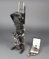 A large Beck model 50 binocular microscope serial no. 19554, 87cm h x 24cm w x 24cm d