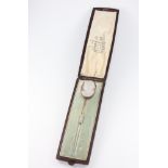 A Victorian yellow metal carved intaglio portrait tie pin in original box