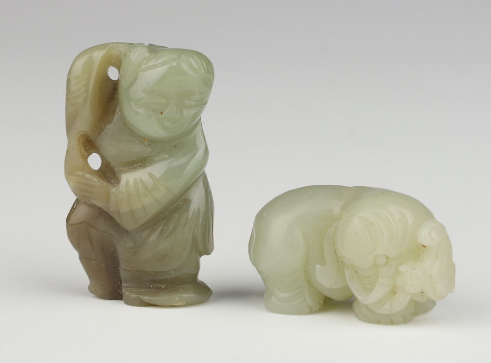 A Chinese hardstone carving of a dog 3cm, ditto standing gentleman 4cm The dog is a pendant and is