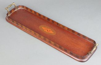 An Edwardian oval inlaid mahogany twin handled bottle tray, the centre inlaid a shell 4cm x 58cm x