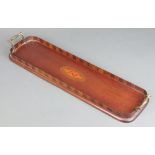 An Edwardian oval inlaid mahogany twin handled bottle tray, the centre inlaid a shell 4cm x 58cm x