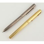 A gold plated Parker ballpoint pen together with a 925 standard ball point pen