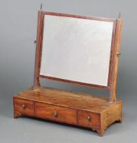 A 19th Century rectangular plate dressing table mirror contained in a mahogany inlaid satinwood