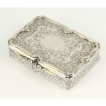 A Victorian silver rounded rectangular table snuff box with scroll decoration and vacant