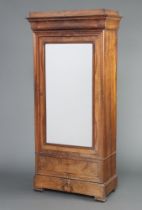 A 19th Century French walnut wardrobe with cushion shaped cornice enclosed by rectangular plate