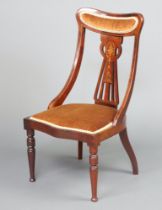 An Edwardian inlaid mahogany slat back bedroom chair, the seat of serpentine outline, raised on