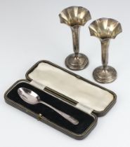 A pair of silver trumpet shaped specimen vases Birmingham 1912 on a spreading foot 11cm, together