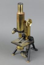 A 19th Century gilt metal single pillar microscope, the base marked W11655