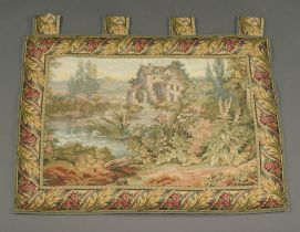 A French style machine made tapestry panel depicting a watermill 89cm x 65cm