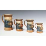 Four Doulton Lambeth salt glazed graduated Toby jugs, bases impressed 8572, 21cm, 15cm, 15cm and