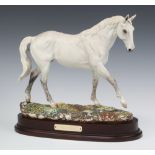 A Royal Doulton limited edition figure of Desert Orchid DA134 no.2493 complete with certificate,