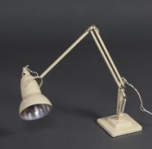 Herbert Terry, a white anglepoise lamp, raised on a stepped square base, 62cm x 15cm x 15cm Some