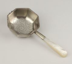 Tiffany, an American Sterling octagonal tea strainer with mother of pearl handle marked Tiffany & Co