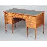 Maple & Co, an Edwardian inlaid and crossbanded mahogany writing table with green inset writing