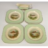 A Woods Ivory Ware 9 piece fish service with sauce boat (cracked) and 8 plates 22cm