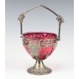A WMF pierced silver plated basket with vinous decoration and red glass liner 12cm Chip to liner