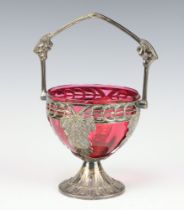 A WMF pierced silver plated basket with vinous decoration and red glass liner 12cm Chip to liner