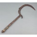 A curious Eastern crescent shaped dagger with skin grip 54cmAdditional images added.