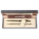 A Schaffer gold plated ballpoint pen together with 1 other cased