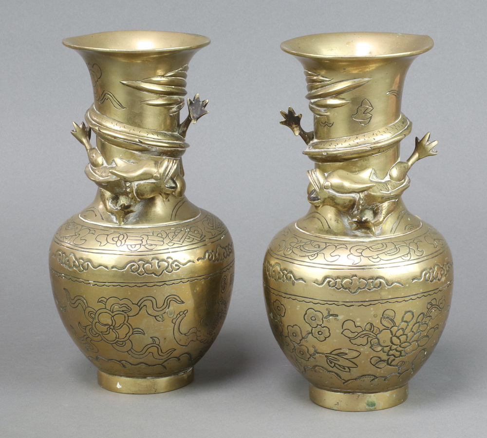 A pair of Japanese polished bronze club shaped vases decorated fish, the base with seal mark 23cm
