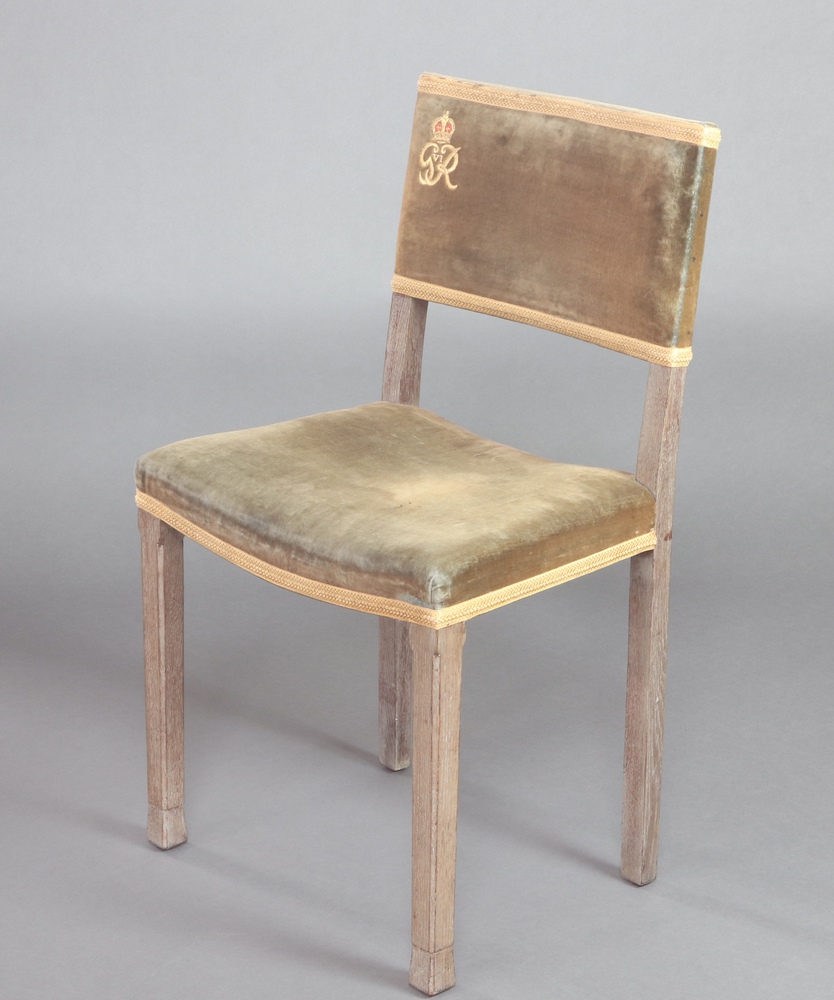 A George VI limed oak Coronation chair, the base marked B North & son, West Wycombe, Coronation 87cm