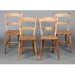 A harlequin set of 4 19th Century elm and beech Windsor bar back chairs with ring turned supports