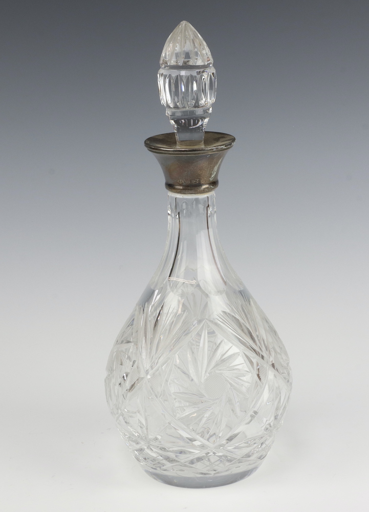 A cut glass mallet shaped decanter with silver collar Birmingham 1976 31cm