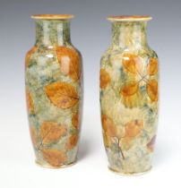 A pair of Royal Doulton vases decorated leaves, the bases impressed Royal Doulton, X85317 2406,