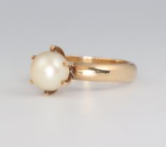 A Continental yellow metal cultured pearl ring 5.4 grams, size O