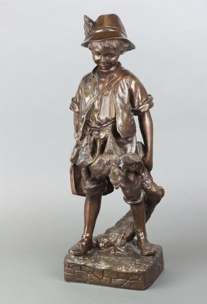 After Auguste Cace, a 20th Century bronze figure of a standing boy with pheasant and hare, "L'enfant