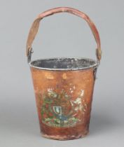 A 19th Century metal and leather covered fire bucket with Royal arms and leather swing handle 24cm x