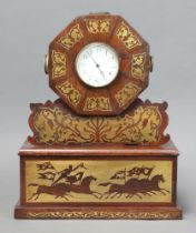 A timepiece with 8cm enamelled dial, Arabic numerals, contained in a rosewood and inlaid brass