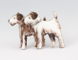 A 1930's yellow metal and enamelled brooch in the form of 2 rough haired Terriers 2cm, contained