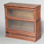 A 2 tier oak Globe Wernicke bookcase the base fitted a drawer 85cm h x 86cm w x 30cm d Top