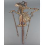 A 19th/20th Century Indonesian pierced puppet with articulated limbs 41cm x 27cm