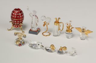 A collection of Swarovski Crystal figures - duck 4cm, balloon group, clam and pearl, Statue of