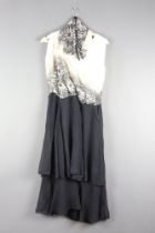 A lady's 1920's full length white "silk" dress with bead work decoration, a 1920's white and black