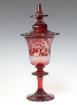 A Bohemian red overlay glass jar and cover decorated a stag 38cmThere is a minor imperfection/chip