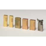 Two gold plated lighters, bases marked Flaminaire, together with 4 other lighters