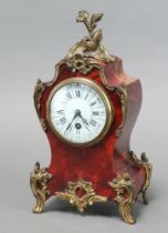 J Martin, A 19th Century French 8 day timepiece with enamelled dial, Roman numerals, contained in