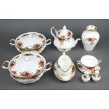 A 57 piece Royal Albert Old Country Rose pattern dinner service comprising 2 tureens and covers,