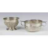 An Edwardian embossed silver sugar bowl Birmingham 1906 together with a silver twin handled bowl