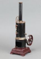 A 19th Century stationary steam engine on a square base 35cm x 10cm The pressure gauge to the