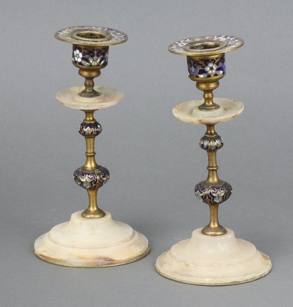 A pair of Victorian alabaster champleve enamel candlesticks 17cm Some light chips to the alabaster