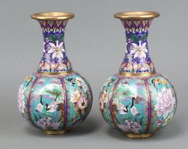 A pair of Japanese cloisonne enamel club shaped vases with panel decoration, decorated birds 26cm