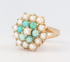 A yellow metal stamped 9ct dress ring set turquoise and pearls, size M, gross weight 4.9g