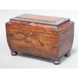 A Victorian rectangular carved coromandel twin compartment tea caddy with hinged lid, (bowl missing)