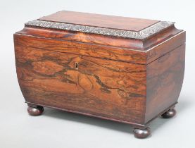 A Victorian rectangular carved coromandel twin compartment tea caddy with hinged lid, (bowl missing)