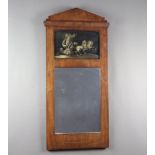 A 19th Century Continental rectangular plate pier mirror in a walnut frame decorated with an