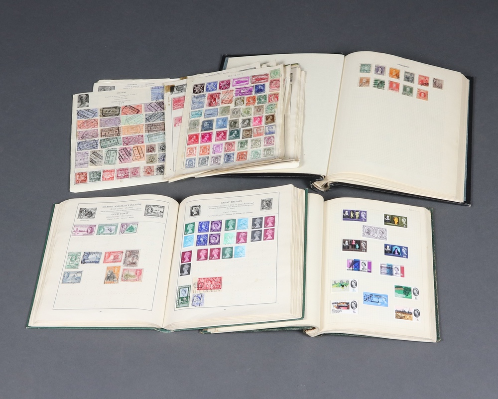 A Capital album of used stamps including Hungary, German, France, Egypt, a green album of world